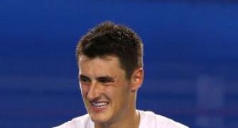 Tomic will play French Open despite troubles: Woodbridge