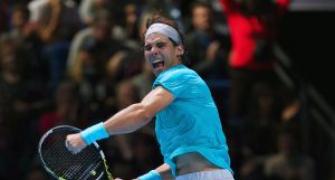 Nadal fends off Wawrinka to seal year end top ranking