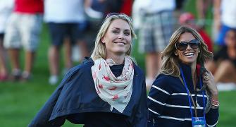 President's Cup: Tiger gets WAGS support on way to opening win