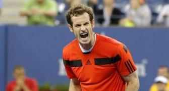 Murray grinds past Istomin into US Open quarters
