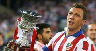 Atletico strike early to beat Real and win Spanish Super Cup