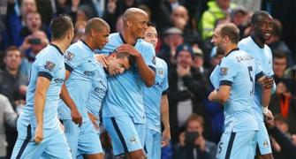 Manchester City bullish after cutting financial losses