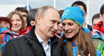 Putin is relishing the spotlight; keeps IOC 'very happy'