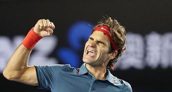 PHOTOS: Federer quells late fightback from Murray to set up Nadal semi-final