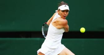 Halep seizes Centre Court chance to open Wimbledon account