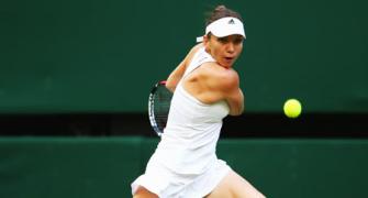 Halep seizes Centre Court chance to open Wimbledon account