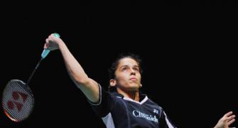 All England Championships: Saina advances, Sindhu crashes out