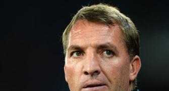 Platini reckons Rodgers must explain selection policy to Reds fans