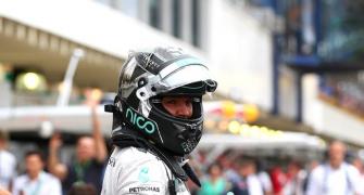 Rosberg beats Hamilton to pole in Brazil
