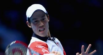 Nishikori powers to victory over Murray at Tour Finals