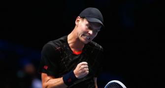 Berdych bounces back to pile misery on Cilic