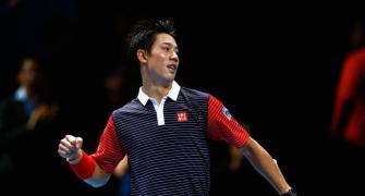 Nishikori beats stand-in Ferrer, now must wait