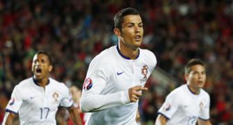 Euro qualifiers: Ronaldo helps Portugal overcome Armenia