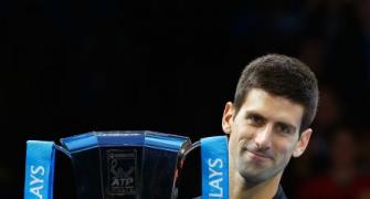 Djokovic wins ATP year-ender after Federer pulls out