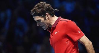 ATP Tour Finals: Federer fights back to set up Djokovic showdown