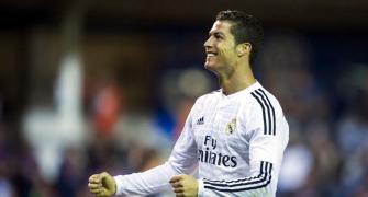 Ronaldo grabs double as Messi breaks goal record