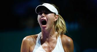 Sharapova grinds out first win but still exits WTA Finals