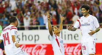 La Liga: Sevilla climb to summit, Atletico win