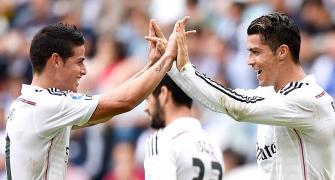 La Liga: Ronaldo treble as Real hit eight, Atletico held