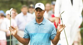 Woods promises trash talking during charity match