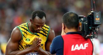 Tired Bolt and Gatlin take it easy in 200 metres heats