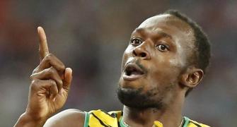 Bolt completes 100-200m double at Worlds