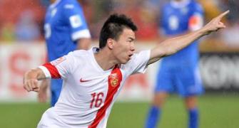 China stun Uzbekistan to make Asian Cup last 8