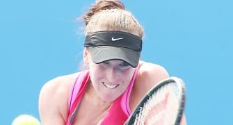 After cancer scare, Brengle slops on sunscreen and slips into 4th round