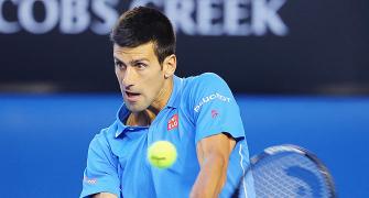 Australian Open: Djokovic crushes Raonic to advance, faces Wawrika in semis
