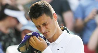 'Arrogant brat' Tomic withdraws from Rome Masters after eight minutes