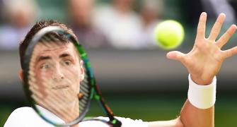 Tomic not ready to mend fences with Tennis Australia