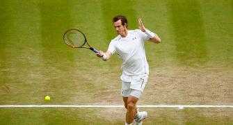 Wimbledon PHOTOS: Murray sets up semi-final showdown with Federer