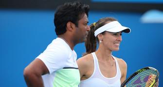 Wimbledon: Paes-Hingis through to semi-finals, Sania crashes out