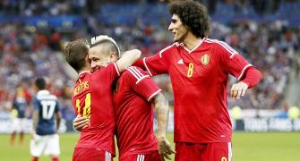 Fellaini nets double as Belgium humble France