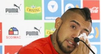 With tears in his eyes, soccer star Vidal asks for forgiveness