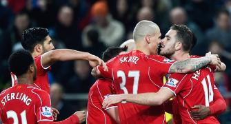 EPL PHOTOS: Henderson's freak goal helps Liverpool