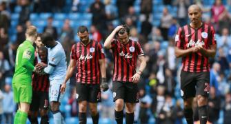 PHOTOS: QPR down after City mauling, Liverpool held