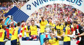 With FA Cup in their bag, Arsenal eye Premier League glory