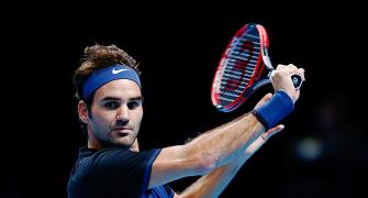 World Tour Finals PIX: Federer ends Djokovic's 23-match winning streak