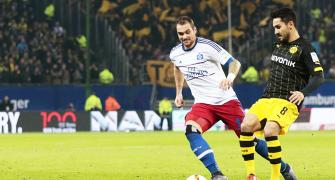 Bundesliga: Hamburg surprise Dortmund amid tight security