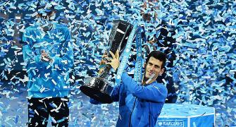 PHOTOS: Djokovic caps brilliant year with Tour Finals win over Federer