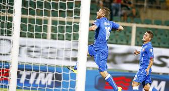 Euro qualifiers: Italy win in Buffon's 150th match; Iceland through