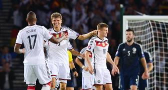 Euro qualifiers, PHOTOS: Germany put Scots on the rocks; Portugal win