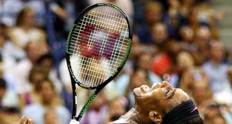 Serena trumps sister Venus to keep calendar Slam on track