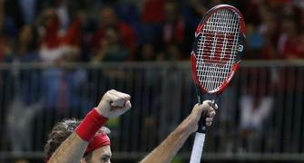 Davis Cup Roundup: Federer helps Swiss win