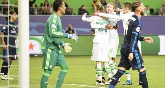 Champions League PIX: Wolfsburg shock Real; City draw against PSG