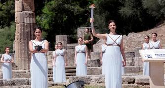 PHOTOS: Sun god Apollo presides over final Olympic flame rehearsal