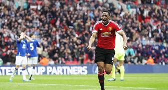 United edge Everton to enter FA Cup final after Martial's late goal
