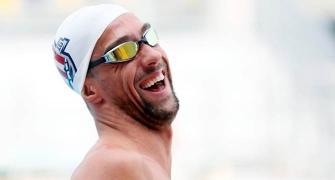Mischievous Phelps leaves door ajar for sixth Games