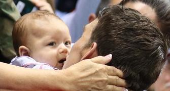 In PIX: Michael Phelps, the father...